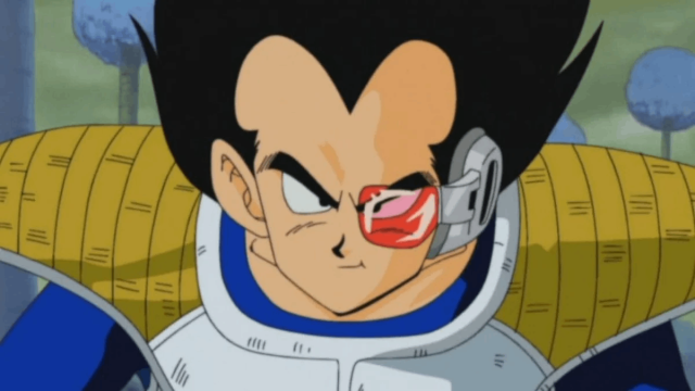 vegeta standing with scouter on eye
