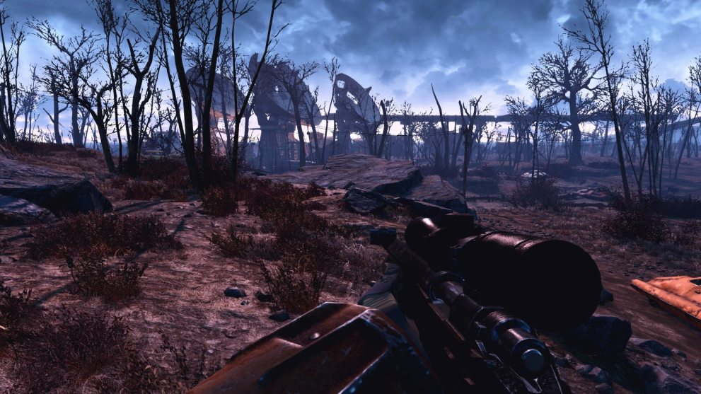 First person view of a man holding a sniper rifle in Fallout 4.