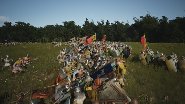 A medieval fight between knights on horses and others on foot