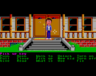 A character outside a house in Maniac Mansion.