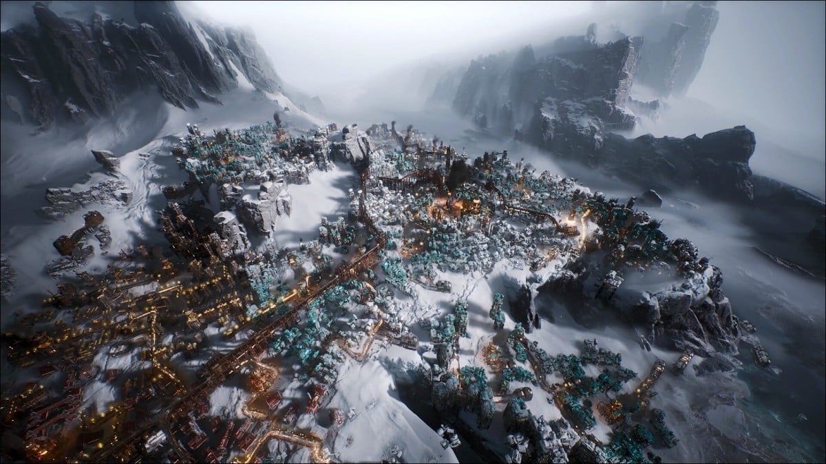 A snowy city in Frostpunk 2.