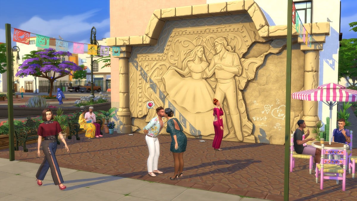 Sims 4 characters kissing outside a monument.