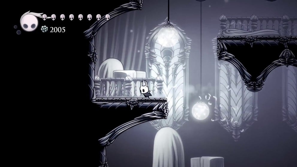 the Hollow Knight walking on a balcony
