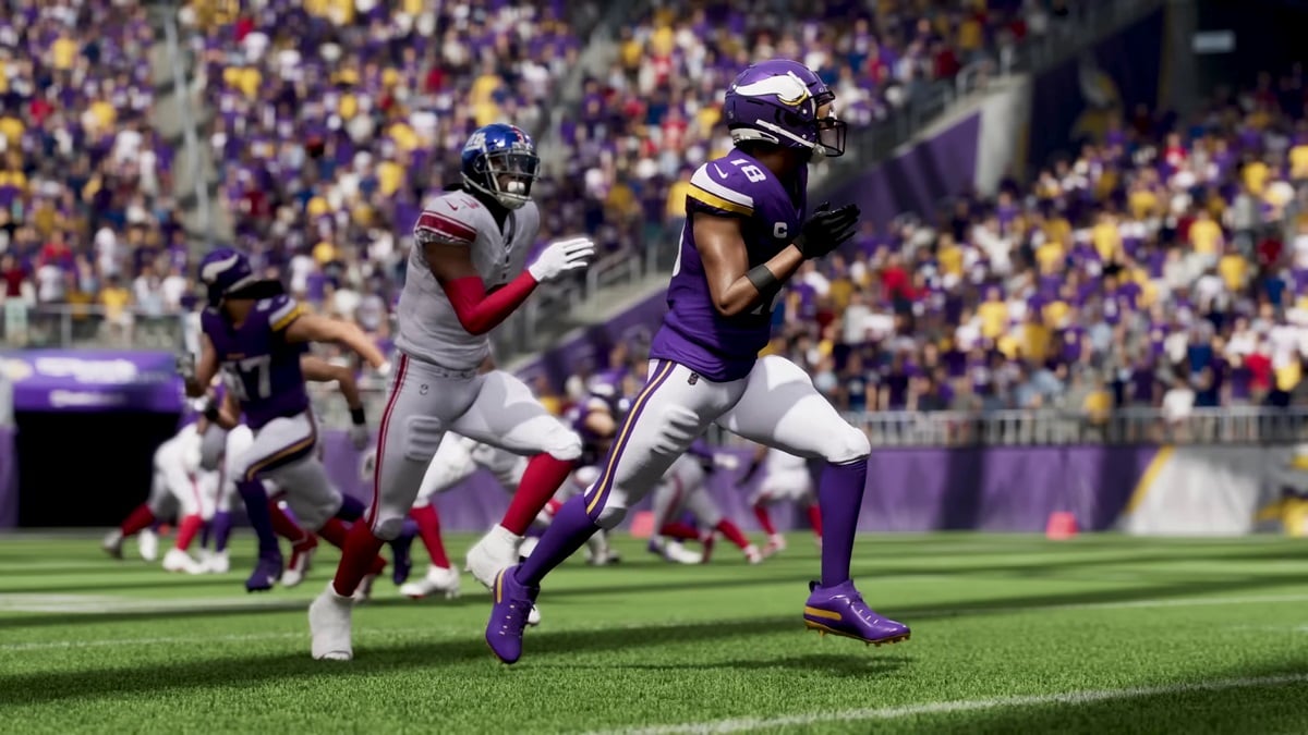 Best teams in Madden 25 - player running through the field ball in hand with another player running after them