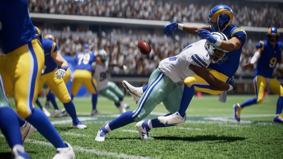 A defender sacking a quarterback in Madden 25.