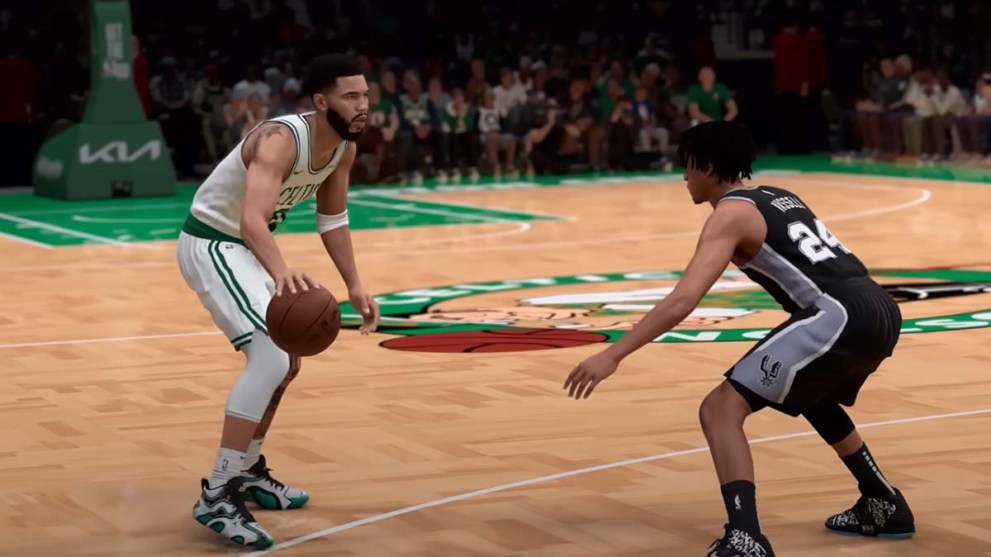 NBA 2K25 Boston Celtics player in possession of basketball with opponent standing in front