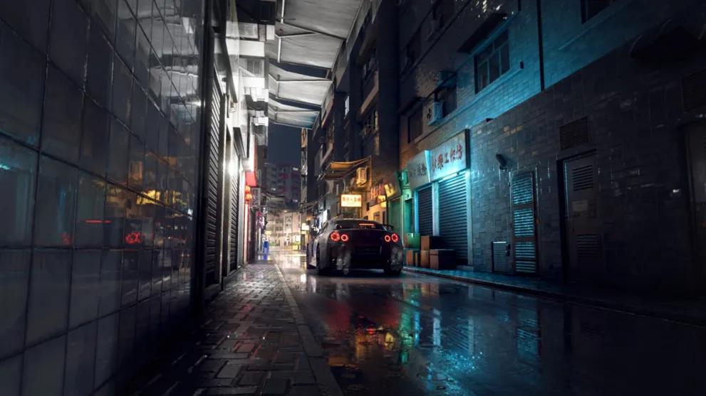 A car in a small street at night